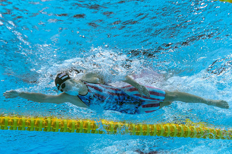 An underwater view shows USA's Kathleen Ledecky competing in a semi-final of the women's 200m freestyle swimming event during the Tokyo 2020 Olympic Games at the Tokyo Aquatics Centre in Tokyo on July 27, 2021. (Photo by François-Xavier MARIT / AFP) (Photo by FRANCOIS-XAVIER MARIT/AFP via Getty Images)